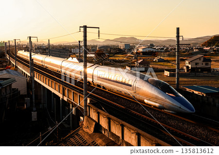 The 500 series Shinkansen in the sunset The 500 series Shinkansen in the sunset 135813612