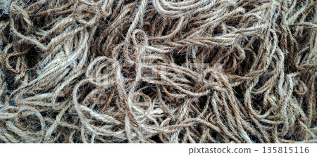 Top View of Intertwined Natural Fiber Ropes Texture for Rustic Background Top View of Intertwined Natural Fiber Ropes Texture for Rustic Background 135815116