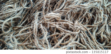 Detailed Texture of Braided Natural Jute Twine in a Tangled Heap 135815117