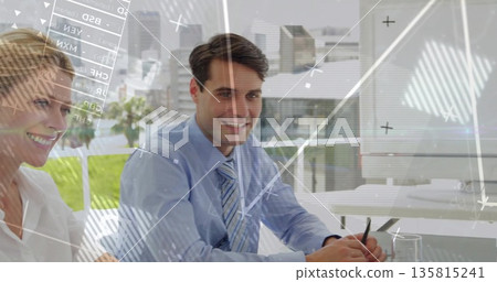 Smiling man in suit analyzing data overlays at glass-topped conference table in high-rise office Smiling man in suit analyzing data overlays at glass-topped conference table in high-rise office 135815241