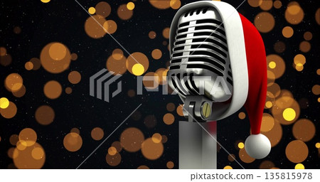 Image of yellow spots over microphone with santa hat Image of yellow spots over microphone with santa hat 135815978
