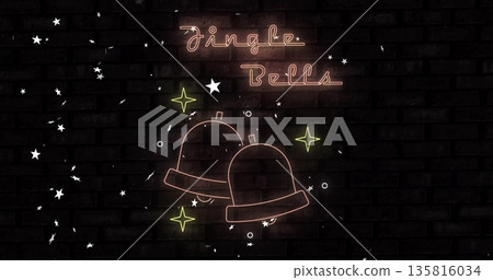 Jingle Bells text image over glowing stars and bells on dark brick wall 135816034