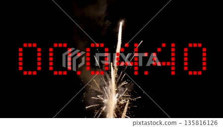 Image of cuntdown over fireworks on black background 135816126