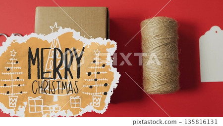 Image of merry christmas text over present on red background Image of merry christmas text over present on red background 135816131