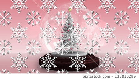 Image of christmas ball over snow falling 135816299