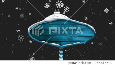 Image of snow falling over blue signpost Image of snow falling over blue signpost 135816300