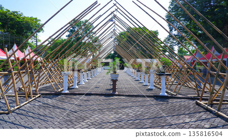 Symmetric Bamboo Structure Over Bonsai Exhibition Lane 135816504