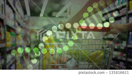 Pushing grocery cart gripping red handlebar moving down supermarket aisle, with DNA helix overlay Pushing grocery cart gripping red handlebar moving down supermarket aisle, with DNA helix overlay 135816621