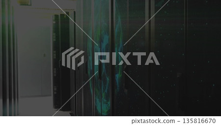 Lining tall black server cabinets along narrow data center corridor, with glowing LED patterns Lining tall black server cabinets along narrow data center corridor, with glowing LED patterns 135816670
