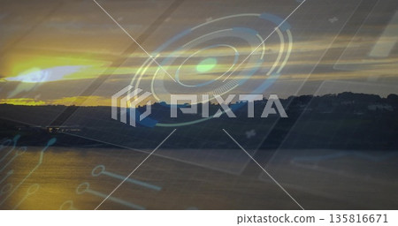 Displaying translucent circular HUD graphic overlaying sunset lake, with golden water reflections 135816671