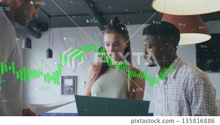 Reviewing teen analyst holding navy document folder at modern office, with digital overlay charts 135816886