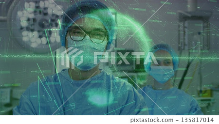 Reviewing patient vitals surgeon with glasses scanning monitor screens and data overlays in OR 135817014