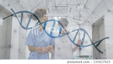 Walking scrub-clad nurse supporting patient in hospital corridor with IV pole pump and DNA overlay 135817023