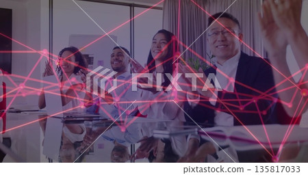 Applauding colleagues engaging around glass table in conference room with digital network overlay Applauding colleagues engaging around glass table in conference room with digital network overlay 135817033