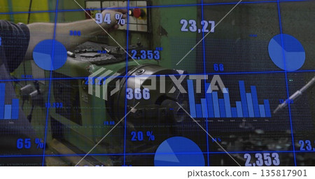 Middle-aged man adjusting lathe control panel on factory floor, with shavings and digital charts Middle-aged man adjusting lathe control panel on factory floor, with shavings and digital charts 135817901
