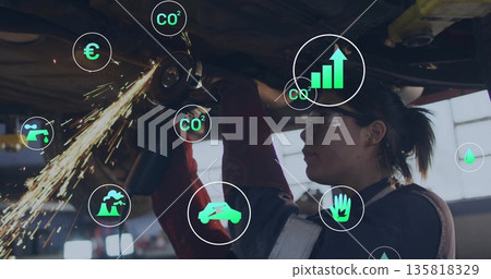 Grinding mechanic with angle grinder beneath car in repair shop, floating digital icons, copy space Grinding mechanic with angle grinder beneath car in repair shop, floating digital icons, copy space 135818329