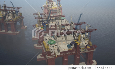 Offshore oil platform crane structures facilitating seabed drilling in thick fog. Hazy ocean mist surrounding industrial gas production rig in ocean extracting petrol, concept of energy production Offshore oil platform crane structures facilitating seabed drilling in thick fog. Hazy ocean mist surrounding industrial gas production rig in ocean extracting petrol, concept of energy production 135818578