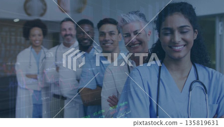 Standing six clinical staff posing diagonally in hospital hall, with stethoscopes and data overlay Standing six clinical staff posing diagonally in hospital hall, with stethoscopes and data overlay 135819631