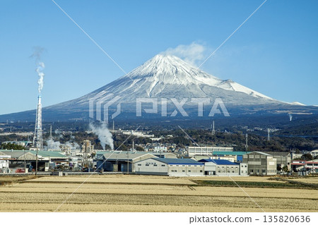 Mount Fuji and paper mills in winter as seen from inside the Tokaido Shinkansen 135820636