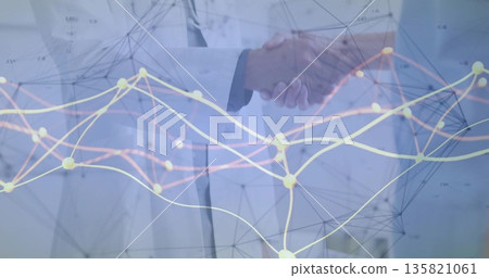 Shaking hands doctor and executive forming data partnership in bright office, with network graphics 135821061