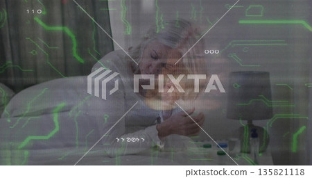 Hugging mother holding child on bed in bedroom, with nightstand lamp, bottles and green overlay Hugging mother holding child on bed in bedroom, with nightstand lamp, bottles and green overlay 135821118