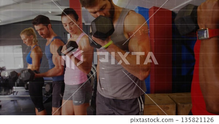Fitness enthusiasts wearing workout clothes performing bicep curls in gym area, with dumbbells 135821126
