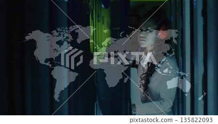 Fixing network cables by headset tech on blinkingLED server racks in datacenter aisle, copy space Fixing network cables by headset tech on blinkingLED server racks in datacenter aisle, copy space 135822093