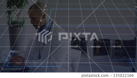 Typing male doctor wearing lab coat, stethoscope at clinic desk with laptop grid overlay copy space Typing male doctor wearing lab coat, stethoscope at clinic desk with laptop grid overlay copy space 135822166