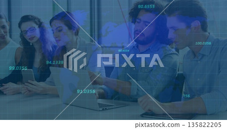 Collaborating team typing on laptops and tablets at conference table, digital data overlay 135822205