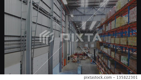 Featuring blue orange pallet rack storing boxes and wrapped pallets in warehouse, copy space Featuring blue orange pallet rack storing boxes and wrapped pallets in warehouse, copy space 135822301