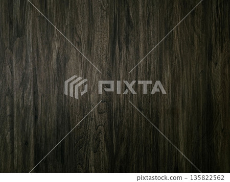 Dark brown rustic background made of a clean processed wooden surface. 135822562