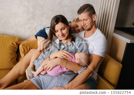 Loving Family With Baby And Older Child 135822754