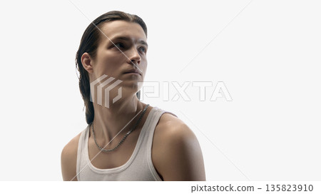 Man portrait looking aside in studio on white background. 135823910