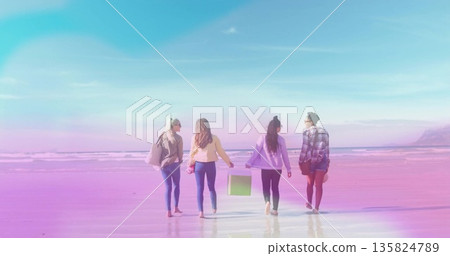 Walking four friends carrying beige tote, pink object, green box, brown purse on low tide shoreline Walking four friends carrying beige tote, pink object, green box, brown purse on low tide shoreline 135824789