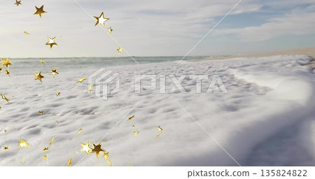 Covering frothy sea foam rolling across sandy beach, with golden star ornaments and ocean waves Covering frothy sea foam rolling across sandy beach, with golden star ornaments and ocean waves 135824822