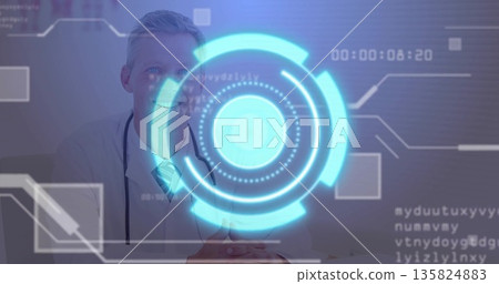 Sitting white coat doctor reviewing holographic data at desk in clinic room, with stethoscope Sitting white coat doctor reviewing holographic data at desk in clinic room, with stethoscope 135824883