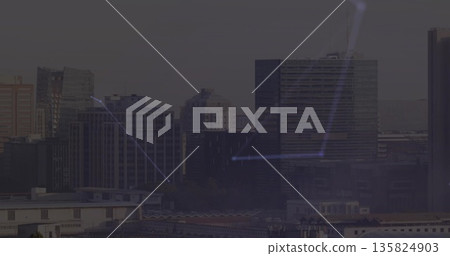 Downtown skyline displaying glowing blue network connections at dusk, with glass office towers 135824903