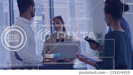 Discussing strategy team members analyzing data on laptop in modern office, with digital overlays Discussing strategy team members analyzing data on laptop in modern office, with digital overlays 135824910