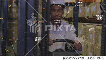 Operating forklift in warehouse, worker wearing hard hat steering among racks with data overlay Operating forklift in warehouse, worker wearing hard hat steering among racks with data overlay 135824978