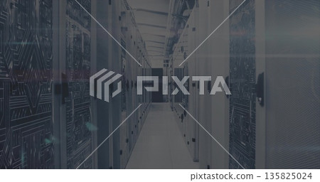 Displaying server room corridor running between server cabinets with patch cables and glowing LEDs 135825024