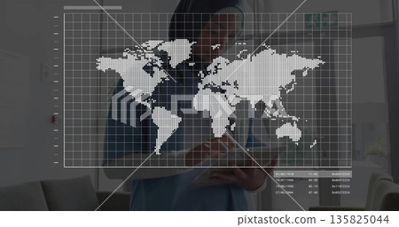 Standing doctor holding digital tablet in clinic with world map grid overlay, sofa, large windows Standing doctor holding digital tablet in clinic with world map grid overlay, sofa, large windows 135825044