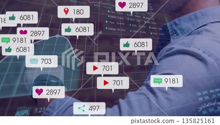 Typing adult male reviewing digital line chart overlay and social icons at office desk, copy space Typing adult male reviewing digital line chart overlay and social icons at office desk, copy space 135825161