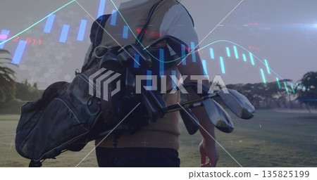 Walking mature Chinese man carrying golf clubs across golf course fairway, showcasing chart overlay Walking mature Chinese man carrying golf clubs across golf course fairway, showcasing chart overlay 135825199