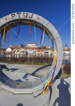 Ptuj sign framing historic town by Drava River Ptuj sign framing historic town by Drava River 135825692