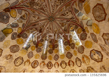 Ornate frescoed ceiling and arched windows in La Romieu Ornate frescoed ceiling and arched windows in La Romieu 135825696
