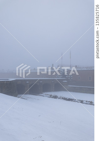 Fortress Terezin in winter fog, cold weather concept 135825716