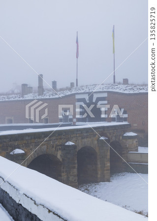 Mala Pevnost Terezin fortress in winter fog Mala Pevnost Terezin fortress in winter fog 135825719