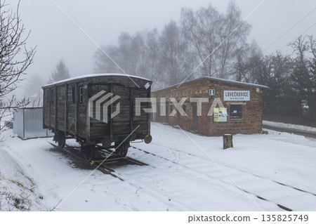 Abandoned train wagon at Loveckovice station in winter Abandoned train wagon at Loveckovice station in winter 135825749