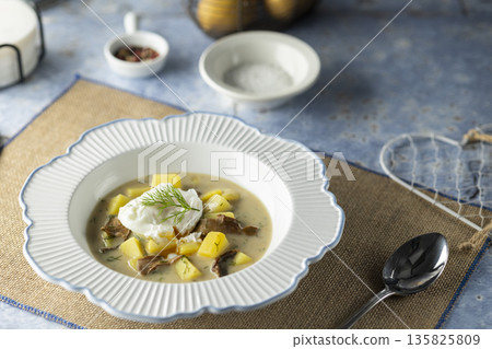 Kulajda creamy mushroom and potato soup with poached egg 135825809