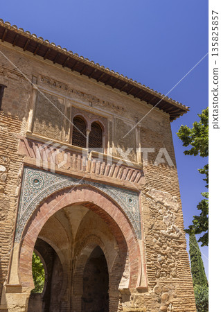 Moorish architecture details on a historic Alhambra gate in Granada, Spain Moorish architecture details on a historic Alhambra gate in Granada, Spain 135825857